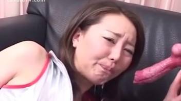 Asian pom-pom girl being controlled by a filthy mutt