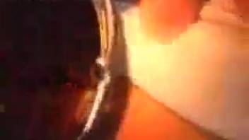 Close-up view of a maggot-ridden vagina in a vintage video