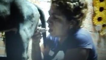 Girl 18+ with cropped hair deep throating a canine penis