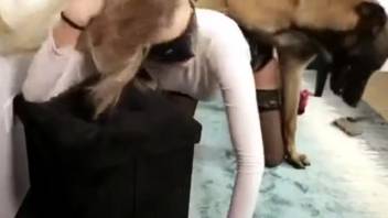 Blonde lady removes her underwear so the dog can screw her