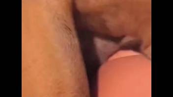 Fair-haired woman in white outfit performing deep throat on penis and additional acts